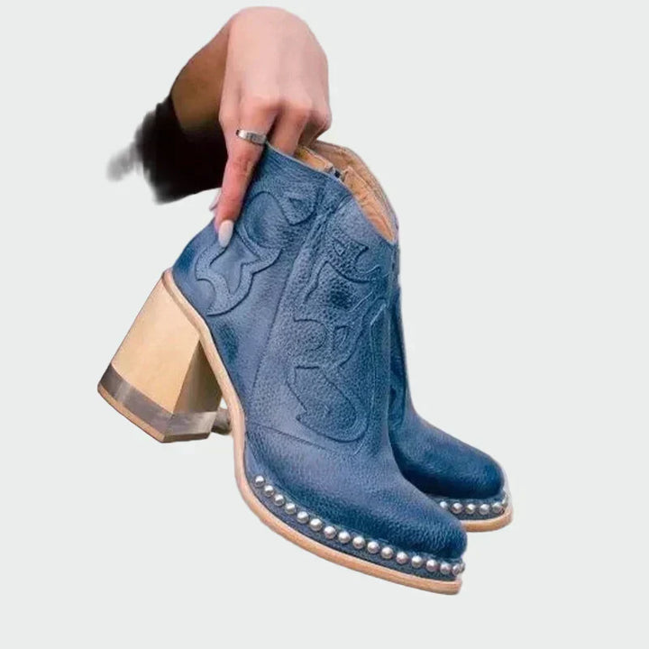 Botas de couro bordadas