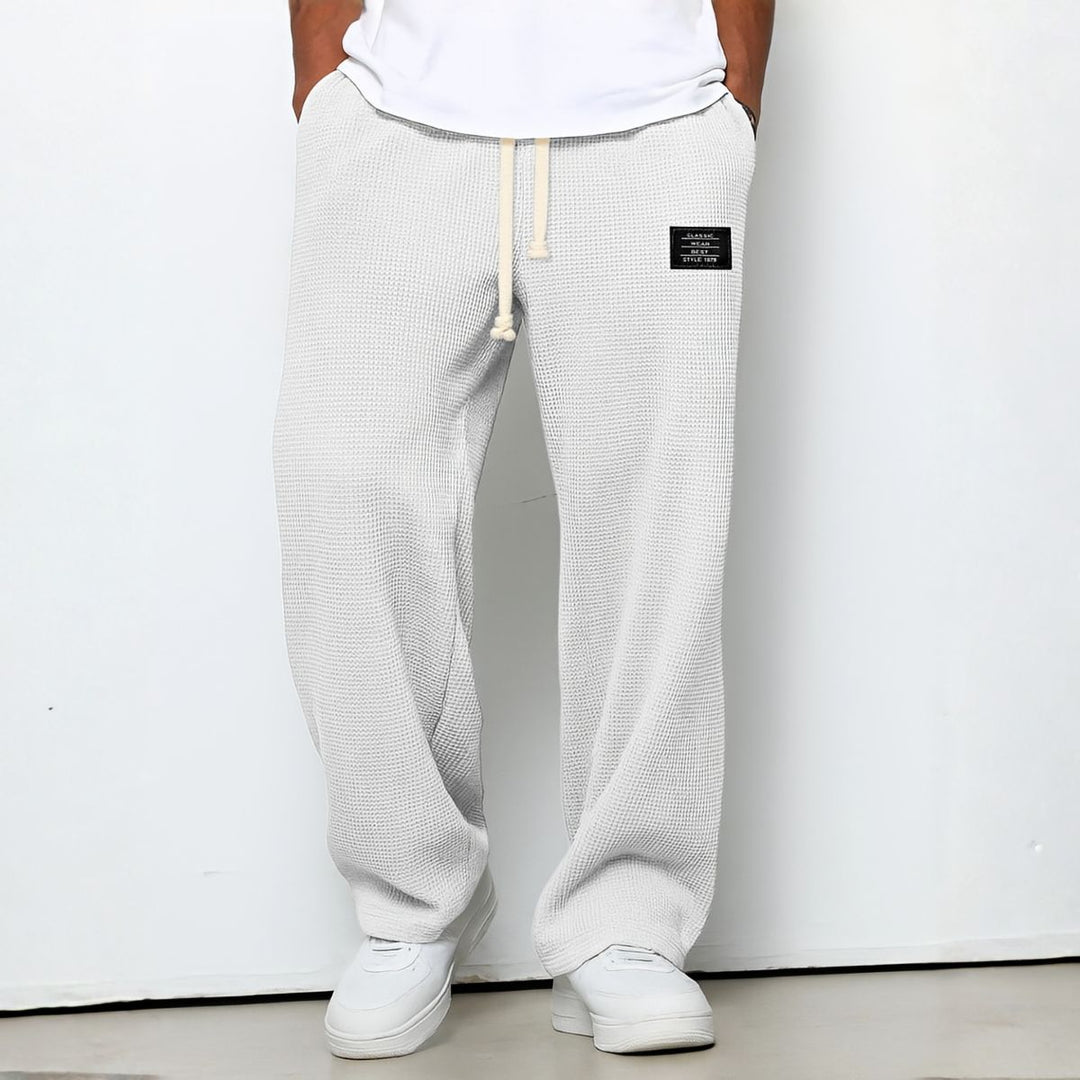 Calça Masculina Confortável com Corte Larguinho e Cintura Ajustável